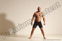 Underwear Gymnastic poses Man Black Muscular Bald Dancing Dynamic poses Academic